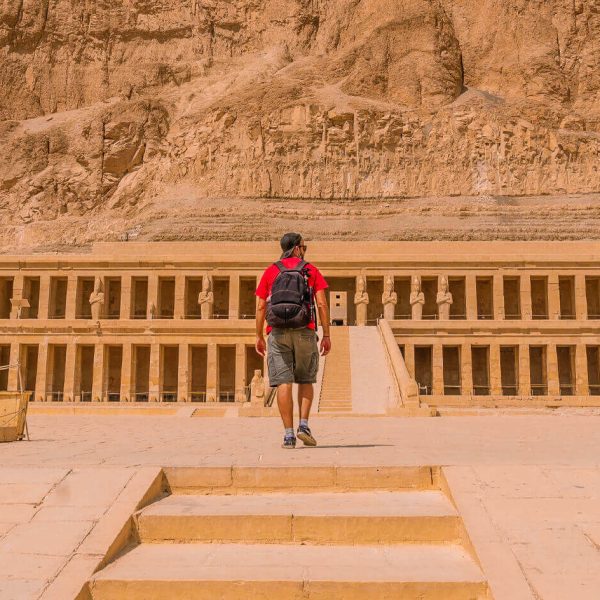 A-picture-of-a-visitor-in-front-of-the-Temple-of-Hatshepsut